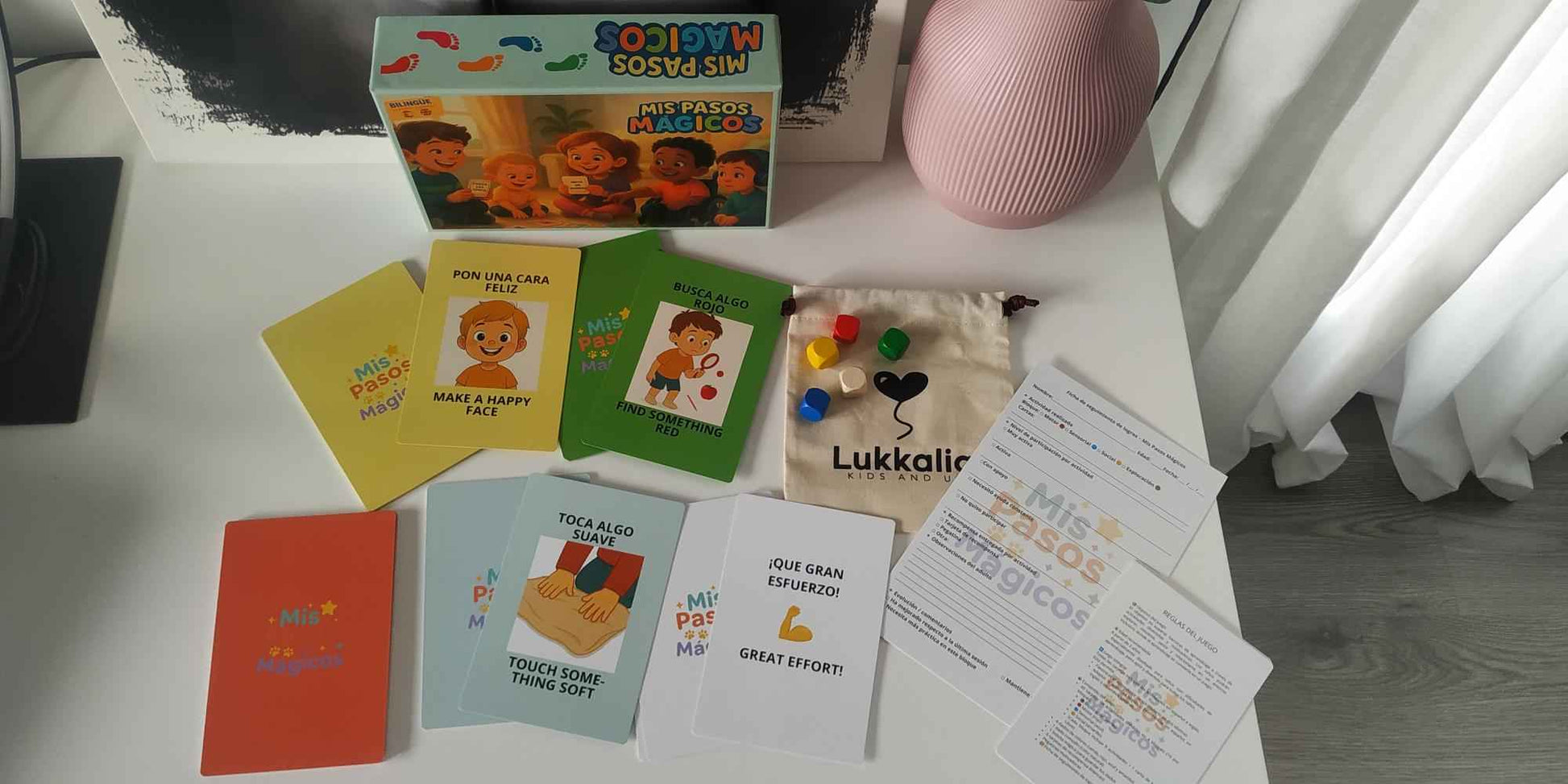 Juego completo “Mis Pasos Mágicos” con cartas bilingües español-inglés, bolsa de tela y ficha de logros.